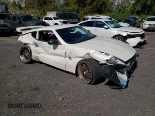 2014 Nissan 370Z Nismo with VIN JN1AZ4EH2EM630833, listed as a Copart auction lot 81773274 with 38,051 mi miles and Salvage Title. Bid and sale history available at DreamBid. Image 4.