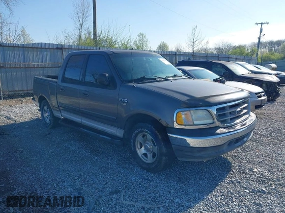 2003 Ford F-150 XLT with VIN 1FTRW07L13KB66977, listed as a IAAI auction lot 41967541 with 124,714 mi miles. Bid and sale history available at carsss.com. Image 1.