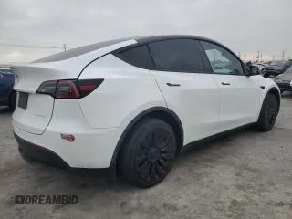 2023 Tesla Model Y Long Range with VIN 7SAYGDEE2PF860135, listed as a Copart auction lot 50380975 with 25,334 mi miles and Salvage Title. Bid and sale history available at DreamBid. Image 3.