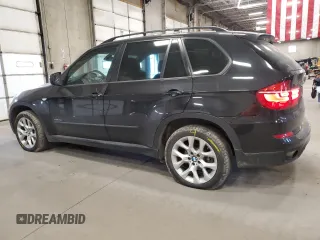 2011 BMW X5 35i z VIN 5UXZV4C52BL743475, wystawiony jako Copart lot #56238615 z przebiegiem 218 738 mil mil oraz Szkoda całkowita • Salvage title. Historia ofert i sprzedaży dostępna na DreamBid. Obrazek 2.