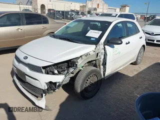 2018 Kia Rio LX with VIN 3KPA25AB8JE087859, listed as a IAAI auction lot 41399650 with 57,770 mi miles and . Bid and sale history available at DreamBid. Image 18.