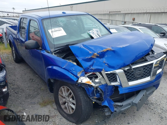 2015 Nissan Frontier SV z VIN 1N6AD0FRXFN758919, wystawiony jako IAAI lot #41909985 z przebiegiem 153 001 mil mil oraz . Historia ofert i sprzedaży dostępna na DreamBid. Obrazek 1.
