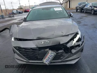 2022 Hyundai Elantra Blue z VIN KMHLM4AJ9NU031372, wystawiony jako IAAI lot #41524681 z przebiegiem 69 060 mil mil oraz . Historia ofert i sprzedaży dostępna na DreamBid. Obrazek 13.