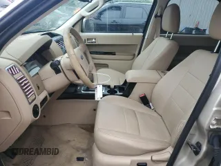 2010 Ford Escape Limited with VIN 1FMCU0EGXAKA03092, listed as a Copart auction lot 61094785 with 114,884 mi miles and Salvage title. Bid and sale history available at DreamBid. Image 7.