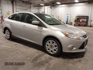 2012 Ford Focus SE with VIN 1FAHP3F21CL463704, listed as a IAAI auction lot 42246436 with 234,474 mi miles and . Bid and sale history available at DreamBid. Image 1.