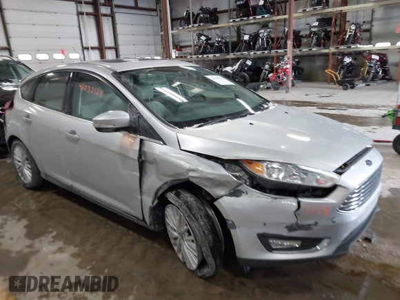 2018 Ford Focus Titanium with VIN 1FADP3N25JL261736, listed as a IAAI auction lot 41032128 with 59,142 mi miles and . Bid and sale history available at DreamBid. Image 1.