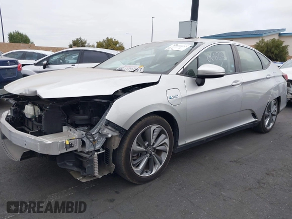 2018 Honda Clarity Touring with VIN JHMZC5F32JC014588, listed as a IAAI auction lot 42066633 with 89,316 mi miles. Bid and sale history available at carsss.com. Image 18.