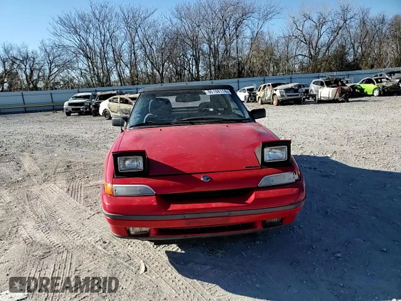 1991 Mercury Capri z VIN 6MPCT0369M8627509, wystawiony jako Copart lot #86108114 z przebiegiem 112 629 mil mil oraz Szkoda całkowita • Salvage title. Historia ofert i sprzedaży dostępna na DreamBid. Obrazek 11.