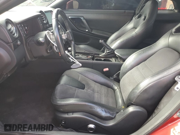 2015 Nissan GT-R Premium z VIN JN1AR5EF9FM280350, wystawiony jako Copart lot #58313634 z przebiegiem 83 387 mil mil oraz Szkody całkowita. Historia ofert i sprzedaży dostępna na DreamBid. Obrazek 7.
