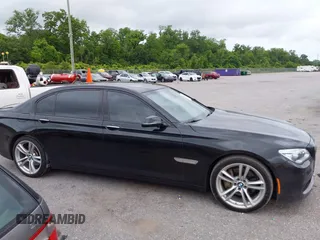 2014 BMW 7 Series 740Li with VIN WBAYE4C51ED138744, listed as a IAAI auction lot 42254213 with 116,157 mi miles and . Bid and sale history available at DreamBid. Image 13.