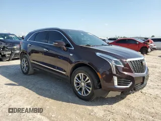 2021 Cadillac XT5 FWD Premium Luxury with VIN 1GYKNCRS2MZ180884, listed as a Copart auction lot 50433445 with 27,246 mi miles and Salvage Title. Bid and sale history available at carsss.com. Image 4.