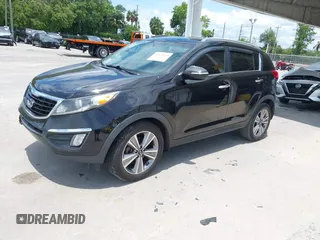2014 Kia Sportage SX with VIN KNDPC3A66E7585269, listed as a IAAI auction lot 42423325 with 173,517 mi miles and . Bid and sale history available at DreamBid. Image 2.