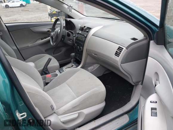 2010 Toyota Corolla with VIN 1NXBU4EE3AZ165944, listed as a IAAI auction lot 42597459 with 211,824 mi miles and . Bid and sale history available at DreamBid. Image 5.
