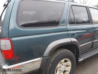 1997 Toyota 4Runner Limited with VIN JT3HN87R1V0078046, listed as a IAAI auction lot 42030550 with 163,683 mi miles. Bid and sale history available at carsss.com. Image 14.