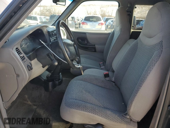 2000 Ford Ranger XLT with VIN 1FTZR15XXYTA37477, listed as a Copart auction lot 43273055 with 160,256 mi miles and Salvage Title. Bid and sale history available at carsss.com. Image 7.