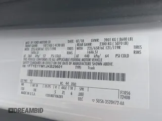 2018 Ford Transit with VIN 1FTYE1YM1JKB29601, listed as a IAAI auction lot 42085587 with 146,846 mi miles and . Bid and sale history available at DreamBid. Image 9.