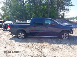 2019 Ram 1500 Big Horn z VIN 1C6RRFFG0KN909003, wystawiony jako IAAI lot #39513660 z przebiegiem 84 291 mil mil oraz . Historia ofert i sprzedaży dostępna na DreamBid. Obrazek 14.
