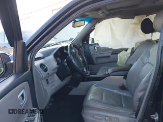 2009 Honda Pilot EX-L with VIN 5FNYF48649B026889, listed as a IAAI auction lot 41643289 with 121,511 mi miles and . Bid and sale history available at carsss.com. Image 5.