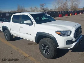 2023 Toyota Tacoma 4WD SR with VIN 3TYCZ5ANXPT170453, listed as a IAAI auction lot 41817973 with 20,935 mi miles. Bid and sale history available at carsss.com. Image 1.