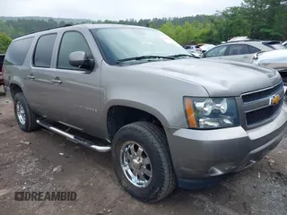 2007 Chevrolet Suburban LT z VIN 1GNFK16307J194973, wystawiony jako IAAI lot #42185667 z przebiegiem 206 531 mil mil oraz . Historia ofert i sprzedaży dostępna na DreamBid. Obrazek 1.