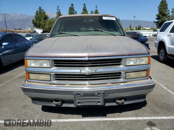 1997 Chevrolet Suburban with VIN 1GNEC16R4VJ418725, listed as a Copart auction lot 75766084 with 216,722 mi miles and Salvage Title. Bid and sale history available at carsss.com. Image 5.