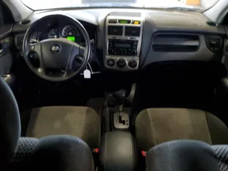 2005 Kia Sportage LX with VIN KNDJE723X57131795, listed as a Copart auction lot 79035214 with 146,746 mi miles and Salvage Title. Bid and sale history available at carsss.com. Image 8.