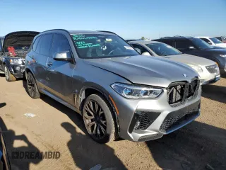 2021 BMW X5 M with VIN 5YMJU0C01M9F10602, listed as a Copart auction lot 65668883 with 23,214 mi miles. Bid and sale history available at carsss.com. Image 4.