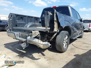 2015 Ford F-150 XL with VIN 1FTEW1CGXFFA33502, listed as a IAAI auction lot 41833755 with 128,475 mi miles. Bid and sale history available at carsss.com. Image 4.