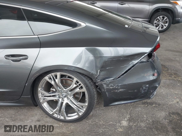 2019 Audi A7 Prestige with VIN WAUV2AF25KN022867, listed as a IAAI auction lot 42100910 with 68,735 mi miles and . Bid and sale history available at DreamBid. Image 18.