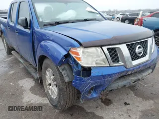 2014 Nissan Frontier SL z VIN 1N6AD0FVXEN705391, wystawiony jako IAAI lot #41539414 z przebiegiem 48 555 mil mil oraz . Historia ofert i sprzedaży dostępna na DreamBid. Obrazek 6.
