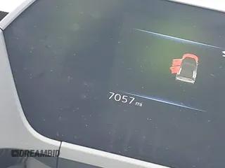 2024 Toyota bZ4X XLE z VIN JTMABACA6RA083823, wystawiony jako IAAI lot #42226912 z przebiegiem 7057 mil mil oraz . Historia ofert i sprzedaży dostępna na DreamBid. Obrazek 7.