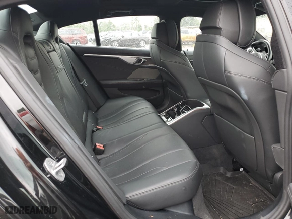 2022 BMW 8 Series 840i with VIN WBAGV4C04NCJ54569, listed as a Copart auction lot 61818223 with 23,680 mi miles. Bid and sale history available at carsss.com. Image 10.