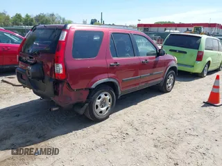 2006 Honda CR-V LX with VIN JHLRD68556C001167, listed as a IAAI auction lot 42104036 with 113,590 mi miles and . Bid and sale history available at DreamBid. Image 4.