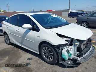 2020 Toyota Prius L Eco with VIN JTDKARFU2L3112354, listed as a IAAI auction lot 42421841 with 76,512 mi miles and . Bid and sale history available at DreamBid. Image 1.