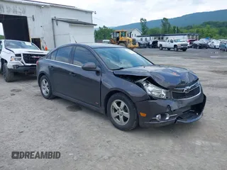 2014 Chevrolet Cruze 1LT with VIN 1G1PC5SB5E7476317, listed as a IAAI auction lot 42455331 with 139,516 mi miles and . Bid and sale history available at DreamBid. Image 1.