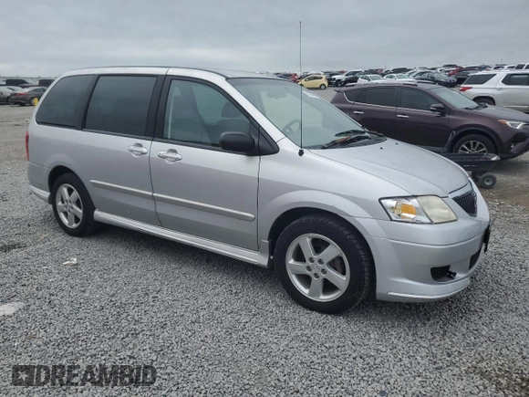 2003 Mazda MPV LX with VIN JM3LW28J730369731, listed as a Copart auction lot 58590885 with 80,179 mi miles and Salvage title. Bid and sale history available at DreamBid. Image 4.