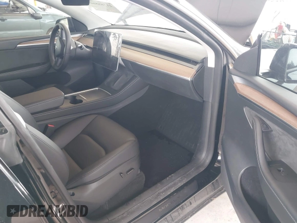 2023 Tesla Model Y Long Range with VIN 7SAYGDEE4PF789102, listed as a IAAI auction lot 41788860 with 88,457 mi miles and . Bid and sale history available at DreamBid. Image 5.