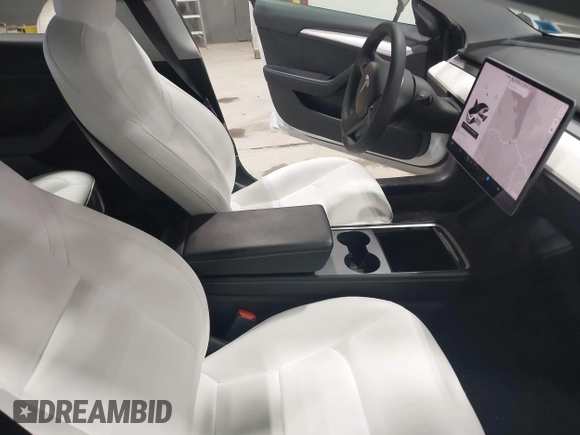 2021 Tesla Model 3 Long Range with VIN 5YJ3E1EBXMF051060, listed as a IAAI auction lot 41958018 with 65,631 mi miles. Bid and sale history available at carsss.com. Image 5.
