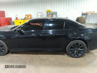 2014 Chrysler 300 S with VIN 2C3CCABG2EH343503, listed as a IAAI auction lot 40934463 with 128,876 mi miles and . Bid and sale history available at carsss.com. Image 14.