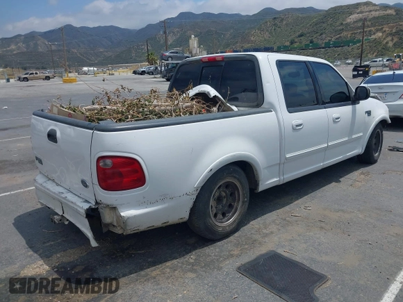 2002 Ford F-150 XLT with VIN 1FTRW07L32KD85390, listed as a IAAI auction lot 42193738 with Not Provided miles and . Bid and sale history available at DreamBid. Image 4.