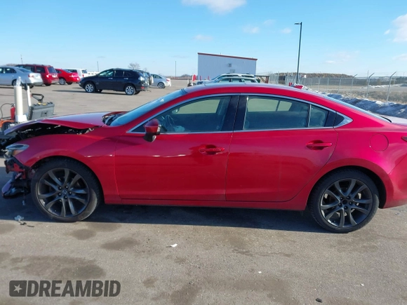 2016 Mazda 6 i Grand Touring with VIN JM1GJ1W51G1443203, listed as a IAAI auction lot 41247354 with 144,840 mi miles. Bid and sale history available at carsss.com. Image 14.