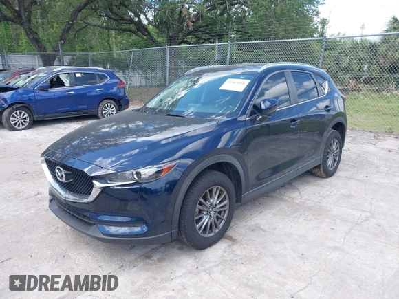 2017 Mazda CX-5 Touring with VIN JM3KFACL0H0227615, listed as a IAAI auction lot 42063618 with 72,291 mi miles. Bid and sale history available at carsss.com. Image 2.