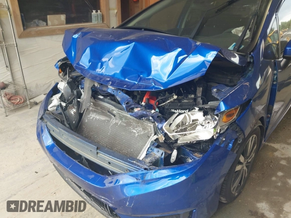 2015 Honda Fit EX-L z VIN 3HGGK5H82FM754220, wystawiony jako IAAI lot #42570240 z przebiegiem Nie podano mil oraz . Historia ofert i sprzedaży dostępna na DreamBid. Obrazek 6.