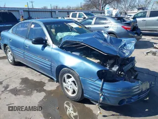 1999 Pontiac Grand Am SE1 with VIN 1G2NE52E6XM791901, listed as a IAAI auction lot 41397903 with 61,349 mi miles. Bid and sale history available at carsss.com. Image 1.
