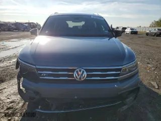 2020 Volkswagen Tiguan SEL Premium R-Line with VIN 3VV4B7AXXLM068664, listed as a Copart auction lot 83243264 with 132,734 mi miles and Salvage Title. Bid and sale history available at carsss.com. Image 5.