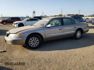 2001 Lincoln Continental with VIN 1LNHM97V01Y616132, listed as a Copart auction lot 75437674 with 113,777 mi miles and Clean Title. Bid and sale history available at carsss.com. Image 1.