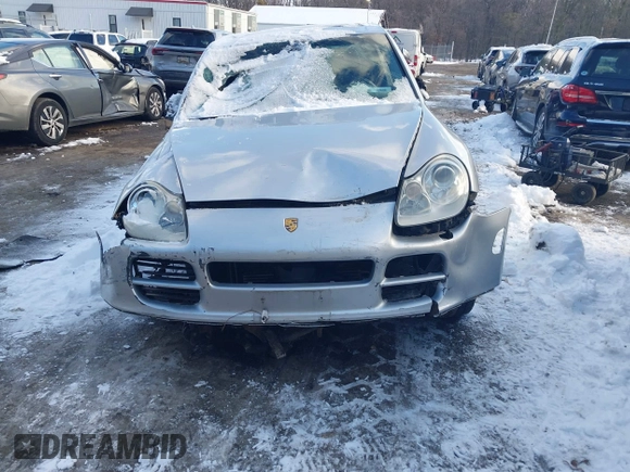 2005 Porsche Cayenne with VIN WP1AA29P75LA22059, listed as a IAAI auction lot 41250250 with 124,835 mi miles. Bid and sale history available at carsss.com. Image 12.