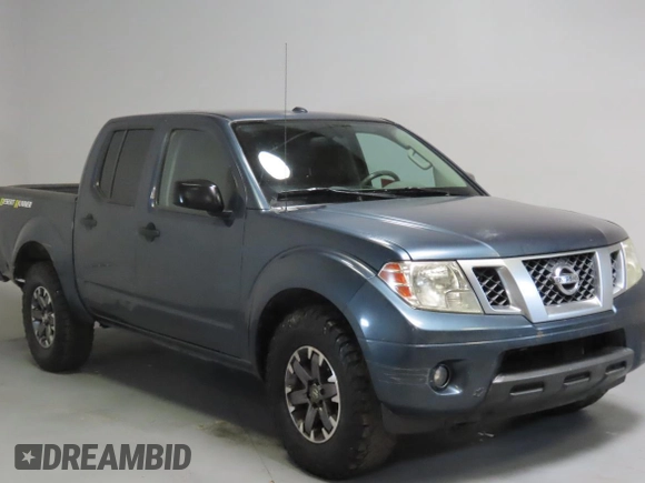 2014 Nissan Frontier SV with VIN 1N6AD0ERXEN763554, listed as a Copart auction lot 64313295 with 109,756 mi miles and Salvage title. Bid and sale history available at DreamBid. Image 1.