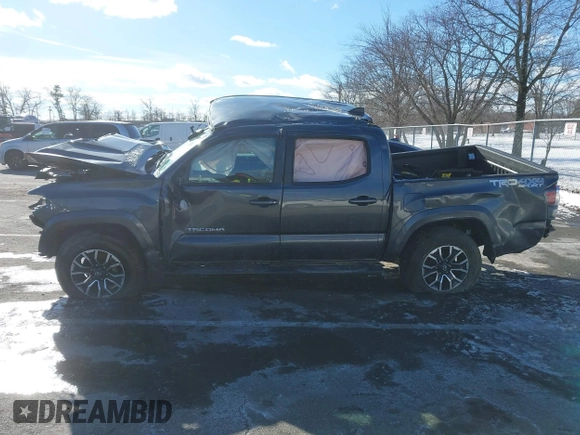 2023 Toyota Tacoma SR with VIN 3TMCZ5AN9PM574534, listed as a IAAI auction lot 41167910 with 27,375 mi miles and . Bid and sale history available at DreamBid. Image 13.