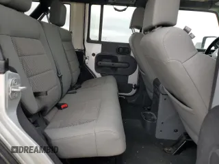 2009 Jeep Wrangler Unlimited Rubicon with VIN 1J8GA69169L731787, listed as a Copart auction lot 44604125 with 180,861 mi miles and Salvage title. Bid and sale history available at DreamBid. Image 11.